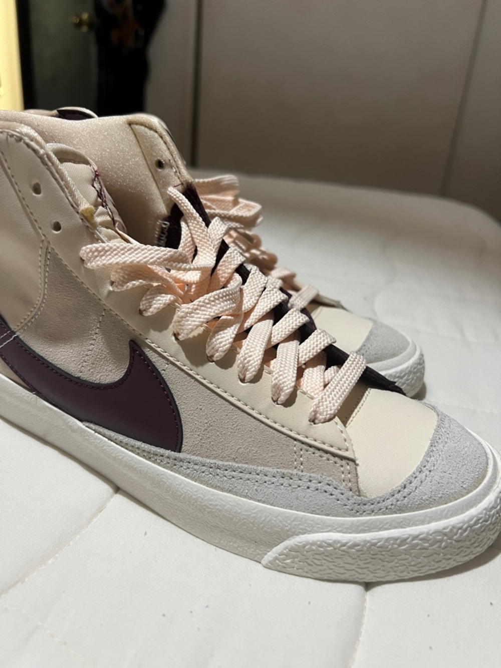 Nike Women's High-Top Sneakers in Cream with Purple Swoosh